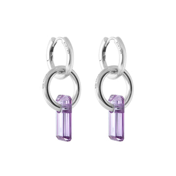 double hoop earrings, ring trough ring, large purple stone trough ring, white background.