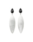 marmor pattern, rubber, large earrings , drop shape rosewood, white background.