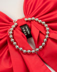 soma x agureeva, red bow, stiff taffeta, statement piece, necklace,  detachable ball chains, silver chain
