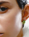 Poison stud earrings, sterling silver, electro plated, irregular shape, green, detail