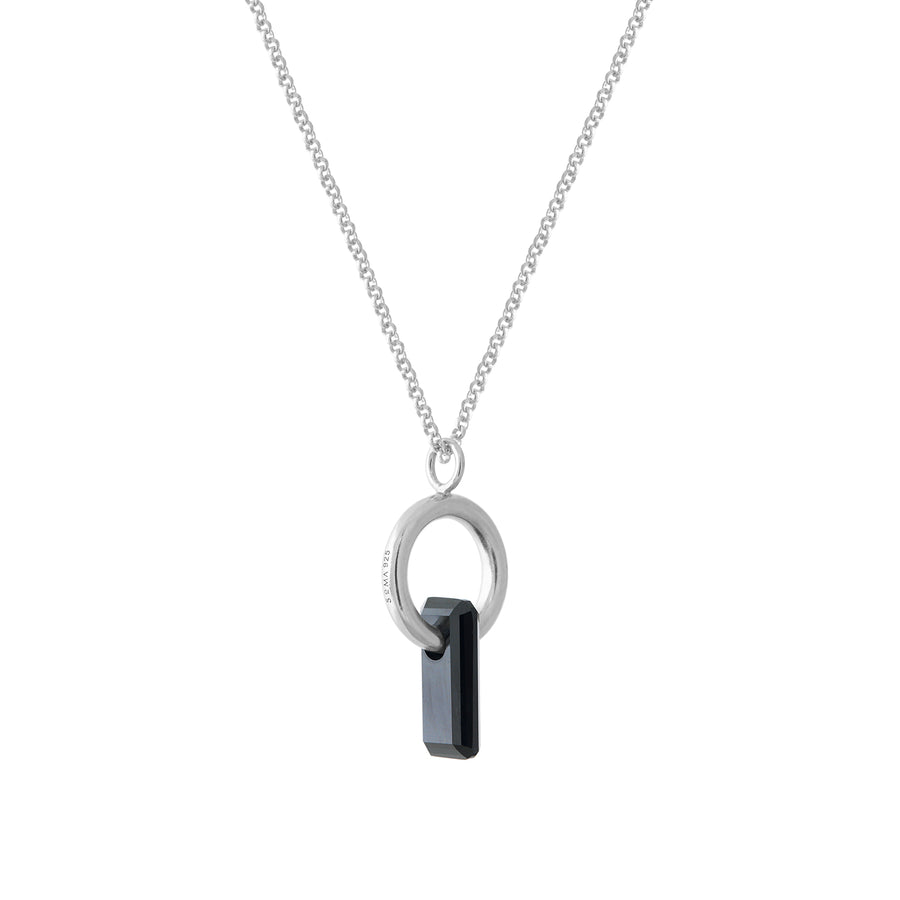 pendant, silver chain, silver ring, rodium covered, large black stone, stone trough hoop, white background.