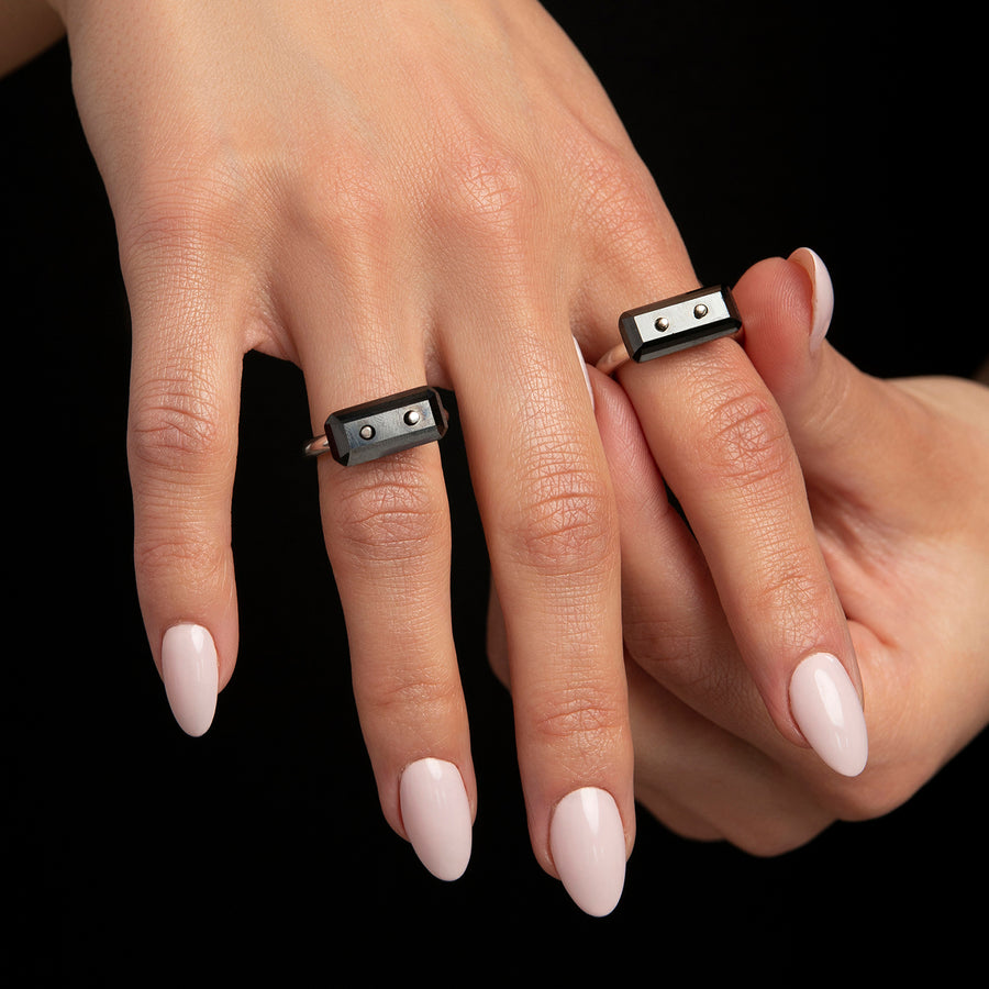 ring, through stone, silver, big black eco stone, white background, close-up