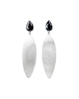 marmor pattern, rubber, large earrings , drop shape black stone, white background.