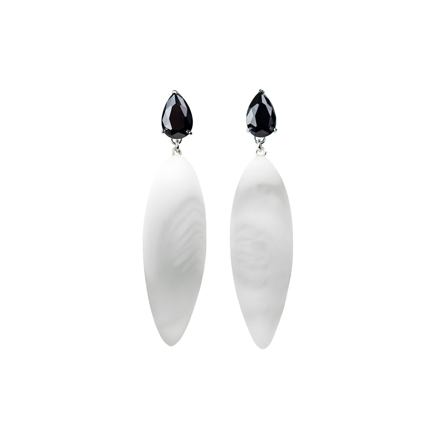 marmor pattern, rubber, large earrings , drop shape black stone, white background.