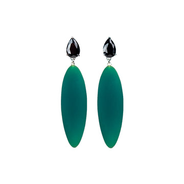 green rubber, large earrings , tear shaped black stone, white background.