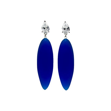 transparent blue rubber, large earrings , drop shaped white stone, white background.
