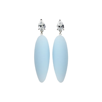 light blue rubber, large earrings , tear shaped white stone, white background.